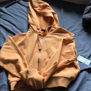 cropped yellow zip up jacket